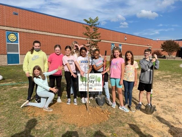 CHANDLER INTERMEDIATE AND KCB MEMBERS PLANT TREES
